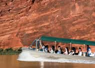 jet boat and canyon wall